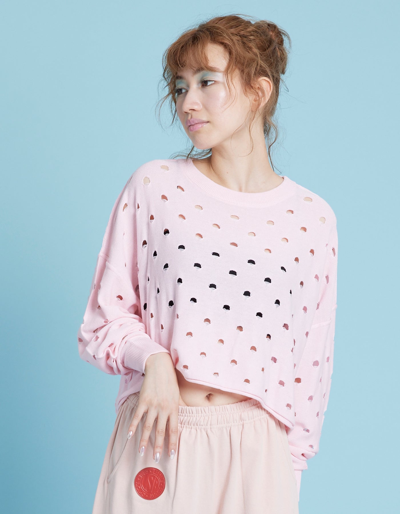 little sunny bite (リトルサニーバイト)Perforated short knit top ...